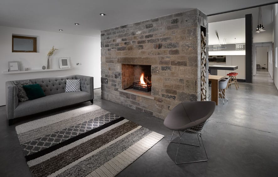 historic barn reinvented modern home exposed trusses 7 fireplace