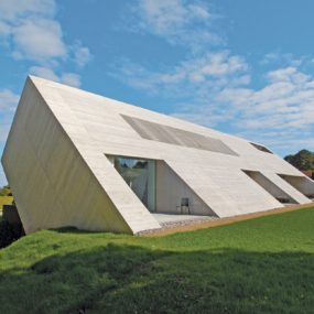 Minimalist Home with Unique Interpretation of Gabled Roof