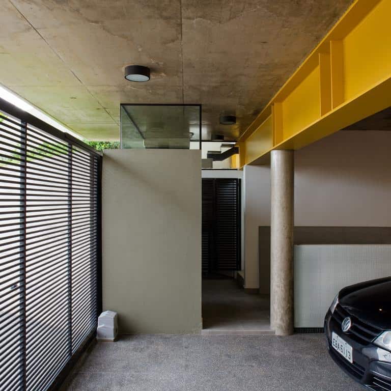 concrete cube home supported 2 yellow i beams 5 garage interior