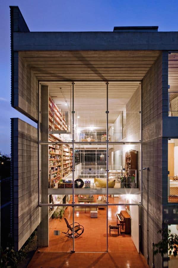 3 storey wall books creates privacy contemporary home  3 entry
