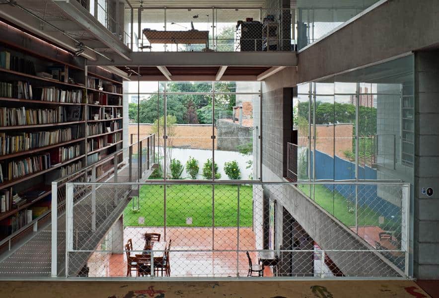 3 storey wall books creates privacy contemporary home  5 backyard