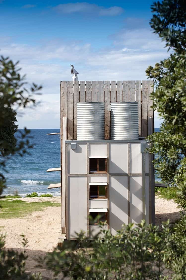 transportable sustainable beach hut rests 2 wooden sleds 6 water tanks