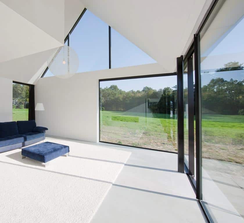 modern barn style home showcases glazings below grade ramp 10 windows
