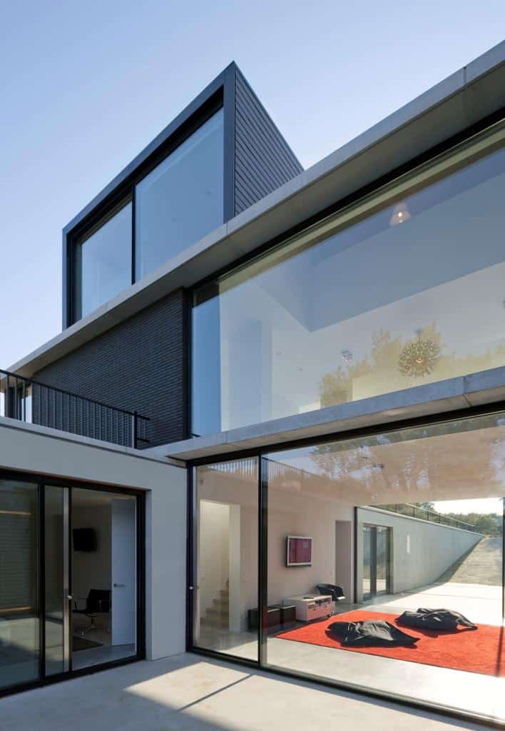 modern barn style home showcases glazings below grade ramp 3 lower level