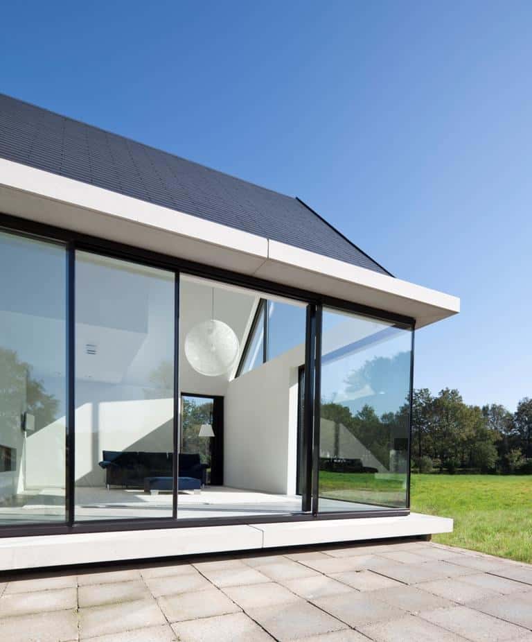 modern-barn-style-home-showcases-glazings-below-grade-ramp-6-social.jpg