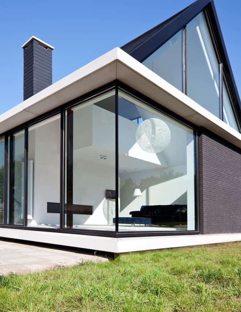 modern barn style home showcases glazings below grade ramp 8 social