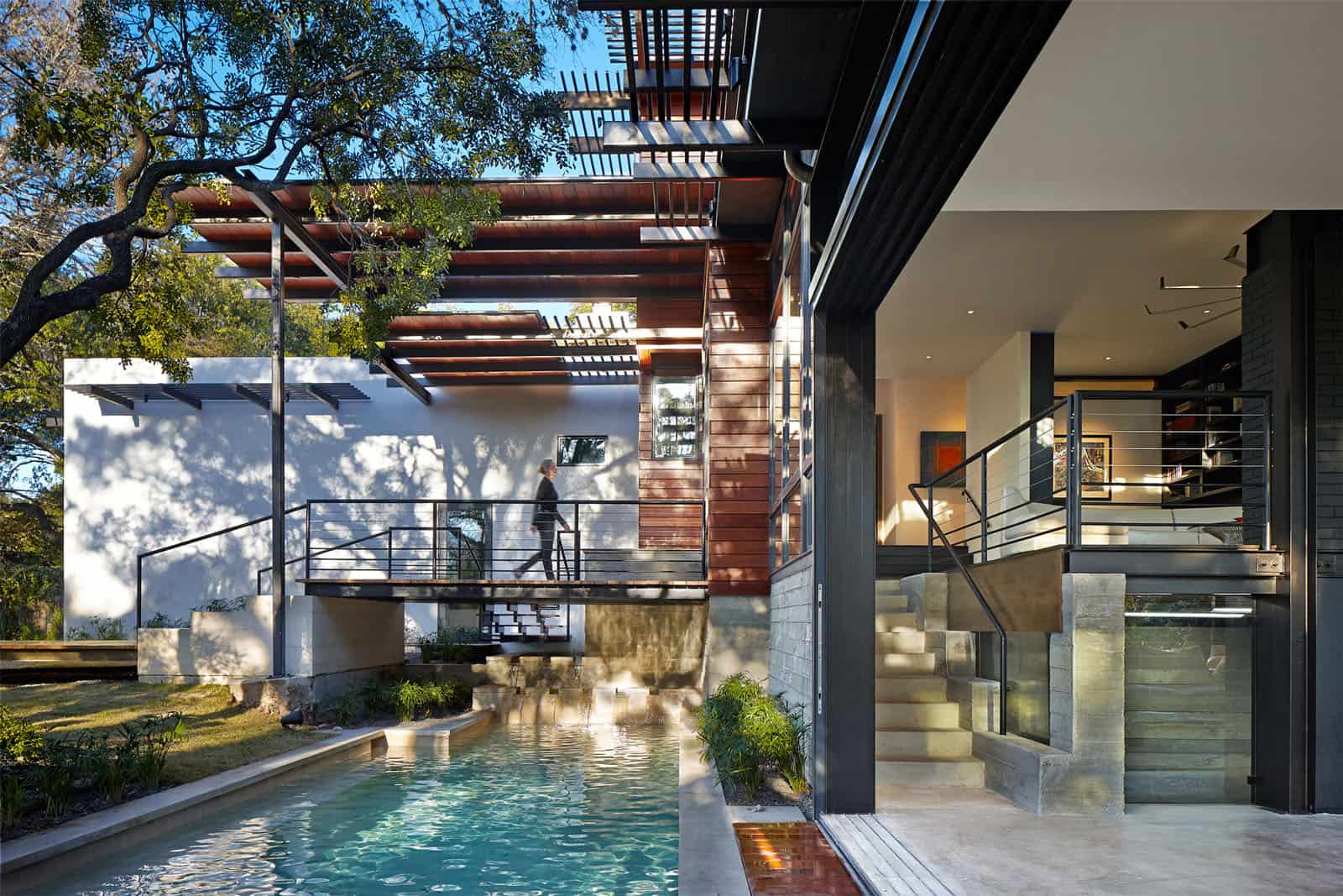 Rancher Morphed into Sustainable 2-Storey House with Bridged Pool