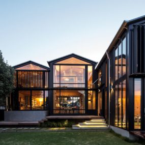 House with 3 Glass Gables Faced with Operable Louvers