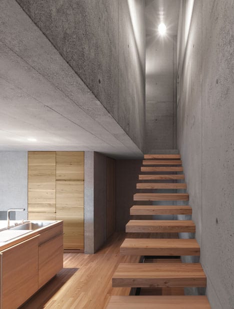 two-concrete-cubes-comprise-main-guest-house-12-stairs.jpg