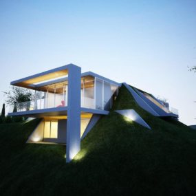 Creatively Semi Buried Home Rises from the Earth like Art