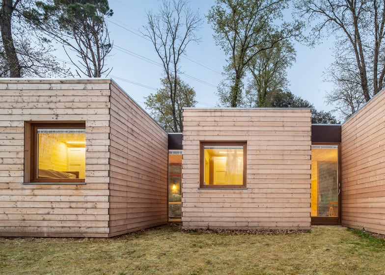 6 prefabricated wood boxes 1 energy efficient house 5 entrance