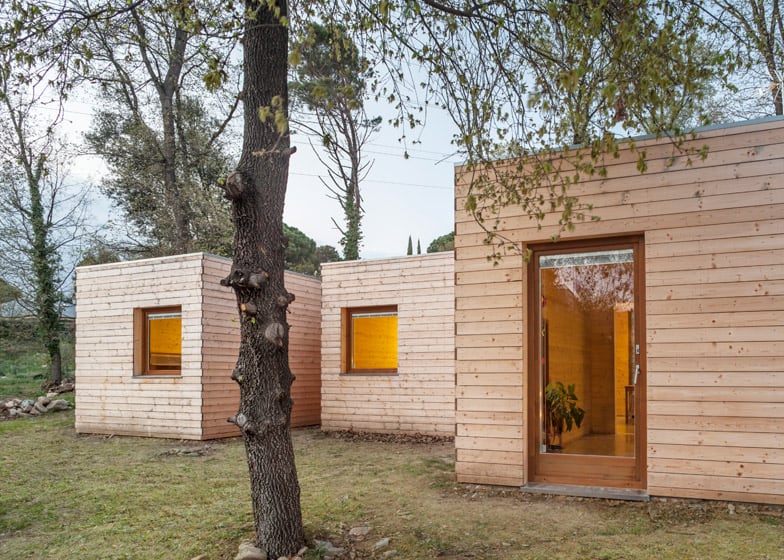 6 prefabricated wood boxes 1 energy efficient house 6 living