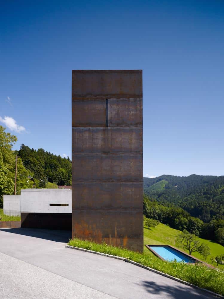 oxidized steel bedroom tower presides house pool 10 tower