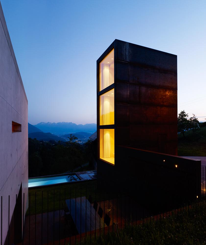 oxidized steel bedroom tower presides house pool 21 tower
