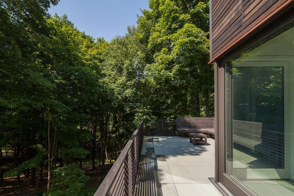 forest home tucked cantilevered terraced site 18