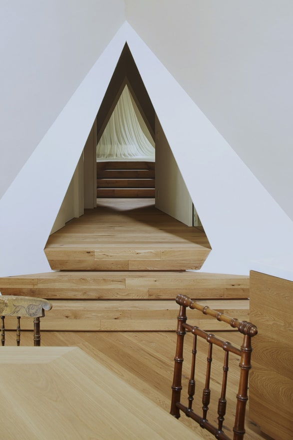 timber vacation house shaped as tepee 13