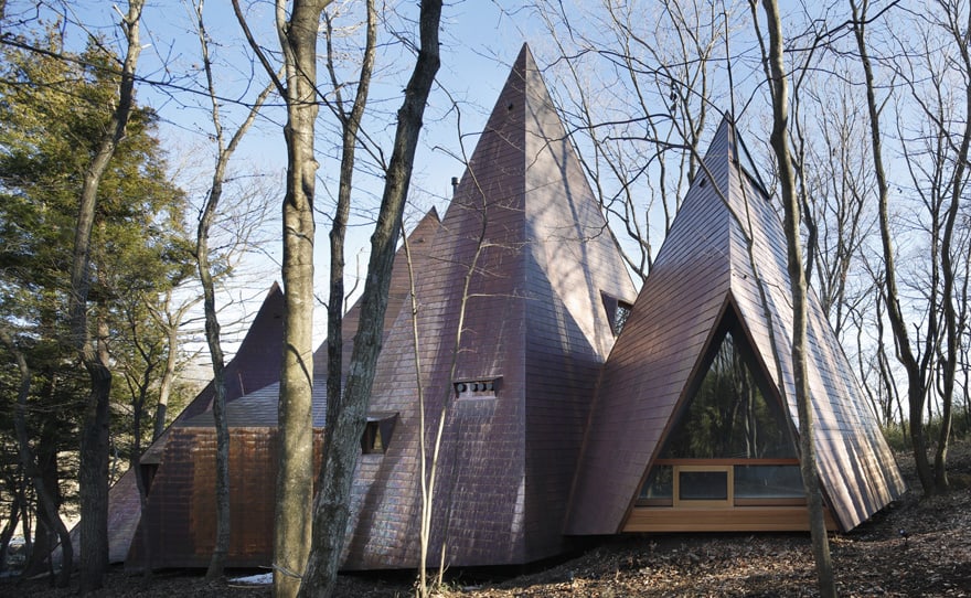 timber vacation house shaped as tepee 2
