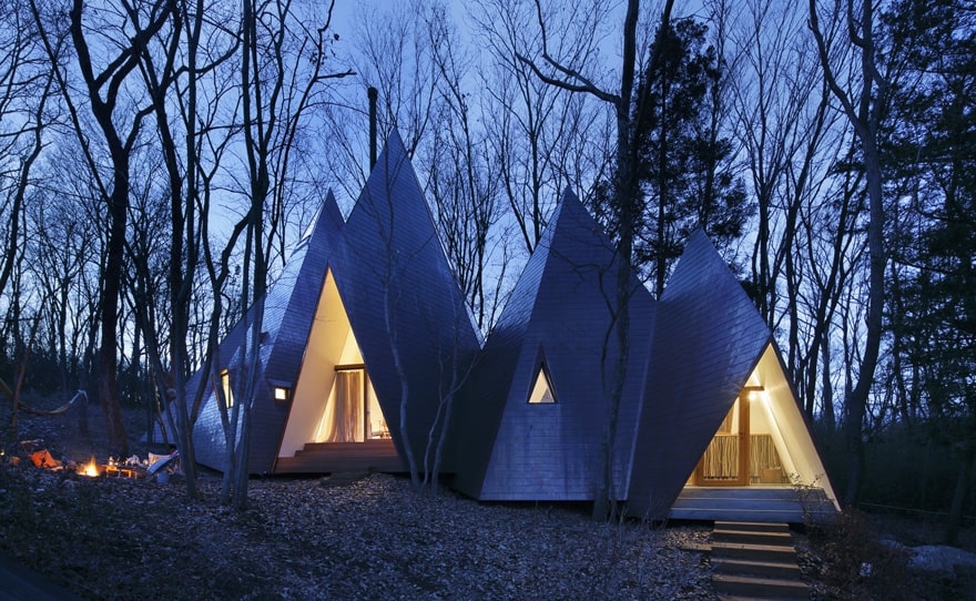 timber-vacation-house-shaped-as-tepee-6.jpg