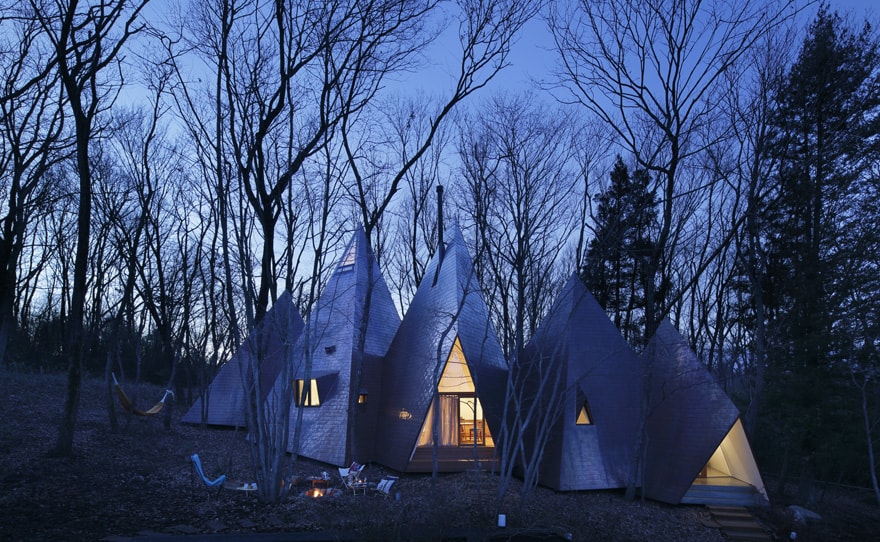 timber-vacation-house-shaped-as-tepee-7.jpg