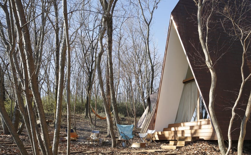 timber vacation house shaped as tepee 8