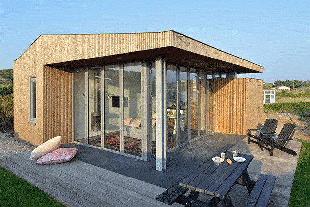 Using Corner Folding Glass Doors Makes this Compact Design a Real Vacation House
