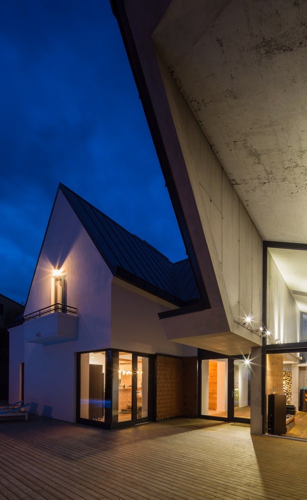 5 asymmetrical concrete addition modernises existing home