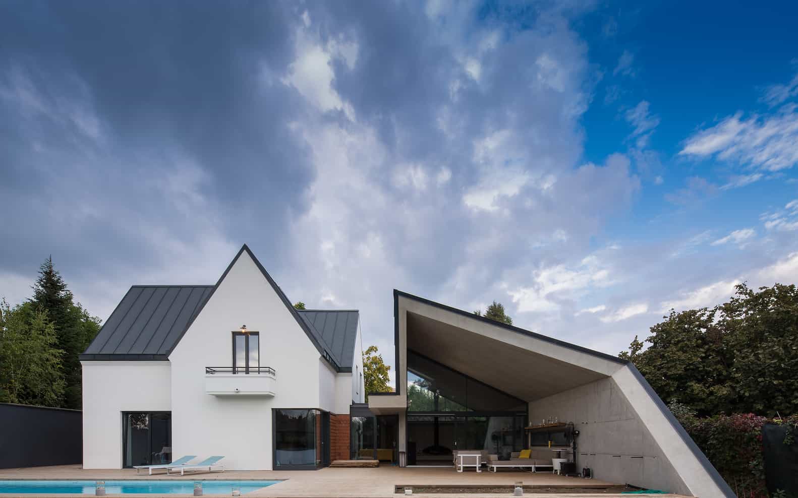 9-asymmetrical-concrete-addition-modernises-existing-home.jpg