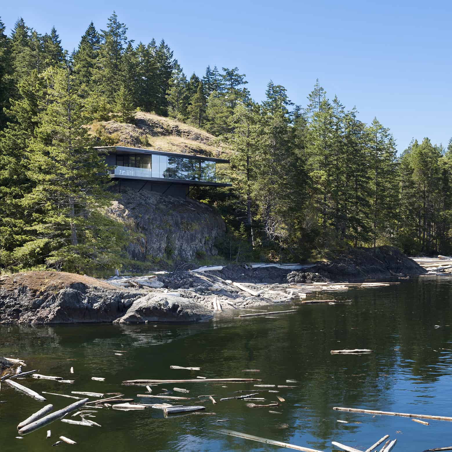 3-luxury-green-roofed-island-home-large-boulder.jpg