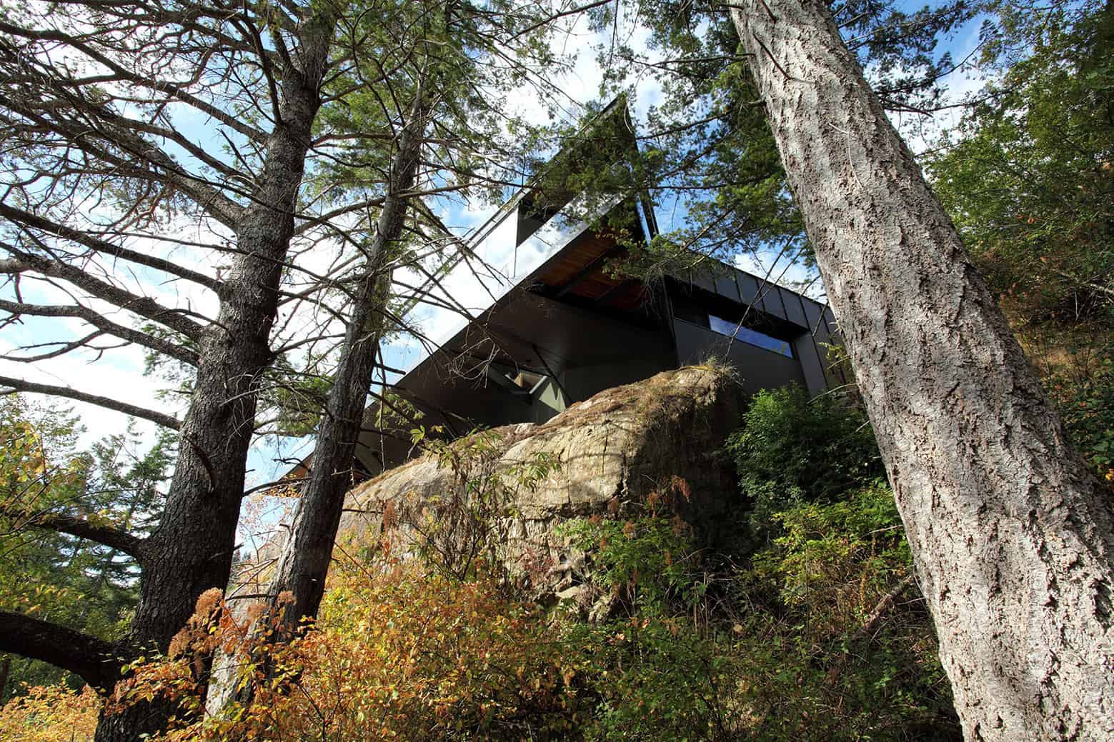 7-luxury-green-roofed-island-home-large-boulder.jpg