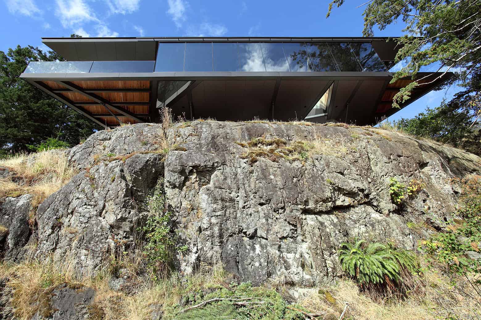8-luxury-green-roofed-island-home-large-boulder.jpg