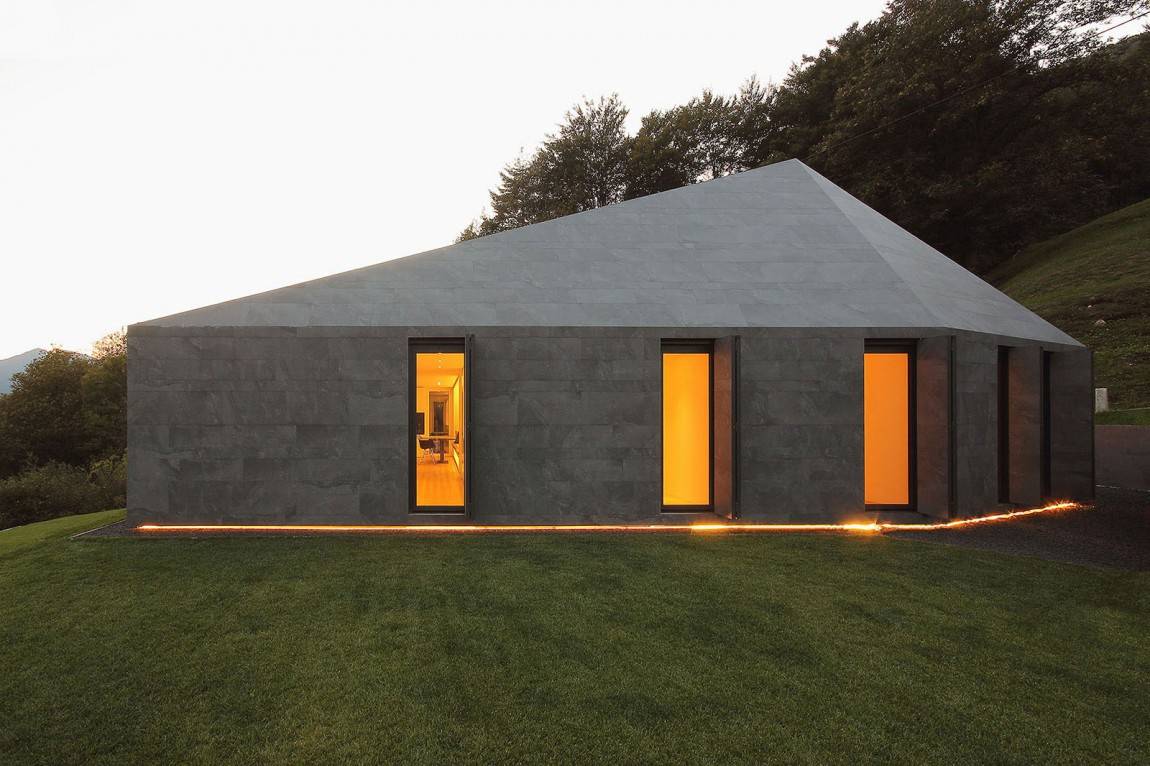 13 prefab swiss alps house designed look like boulder