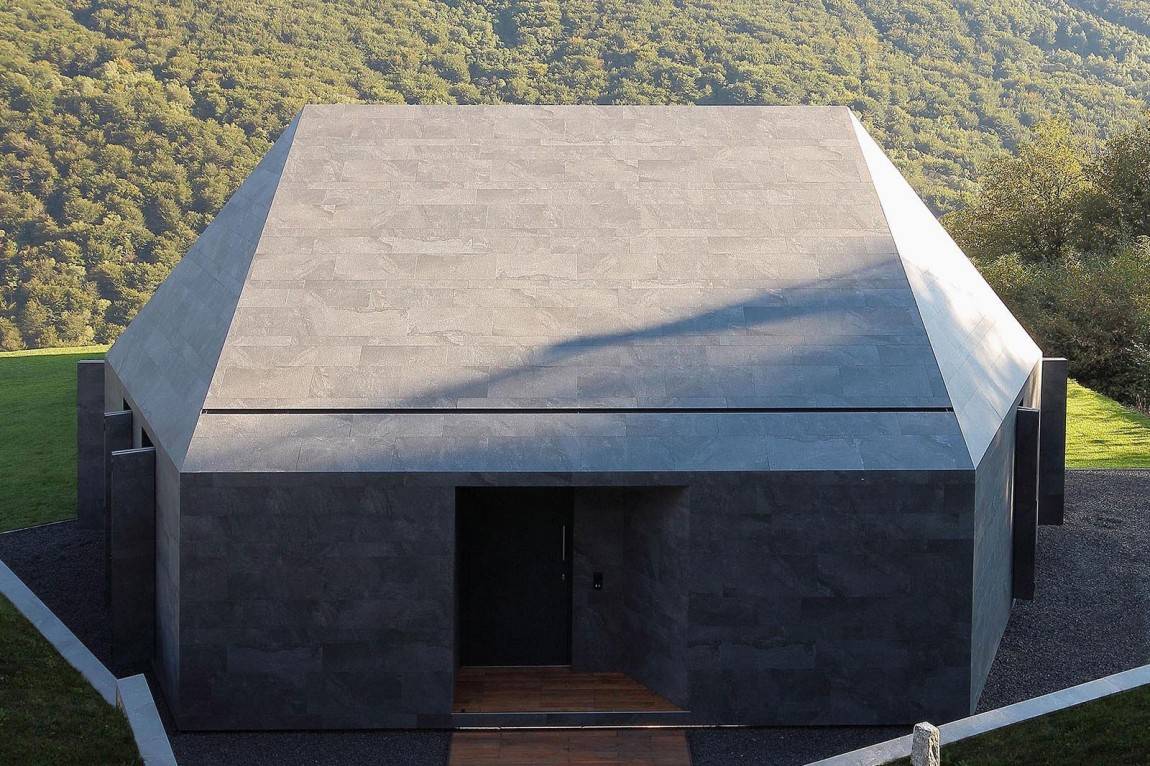 4-prefab-swiss-alps-house-designed-look-like-boulder.jpg