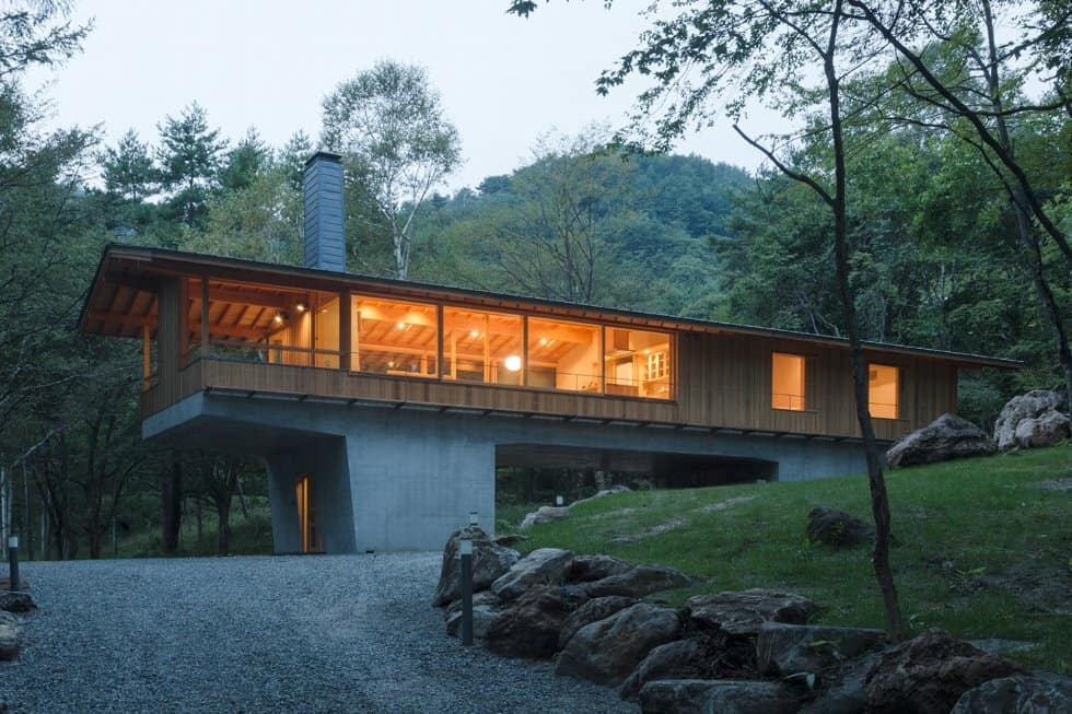 3-concrete-pedestals-elevate-woodland-house-bridge.jpg