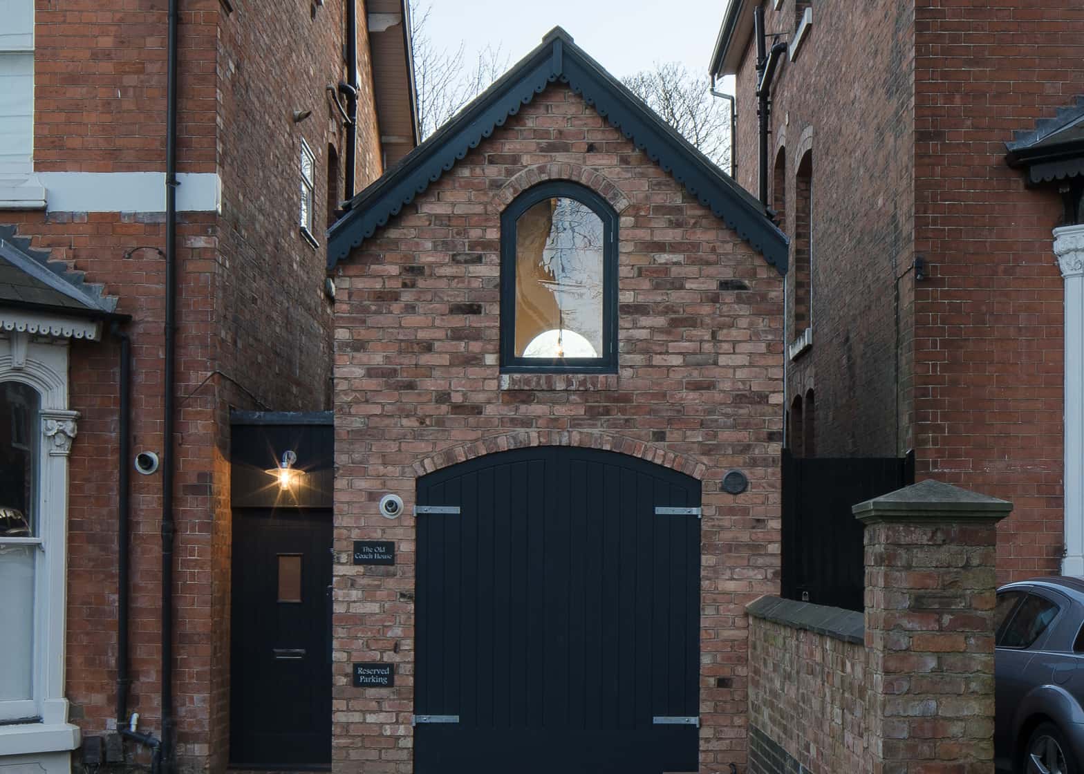 Dilapidated Coach House Reinvented into Small Home with Loft