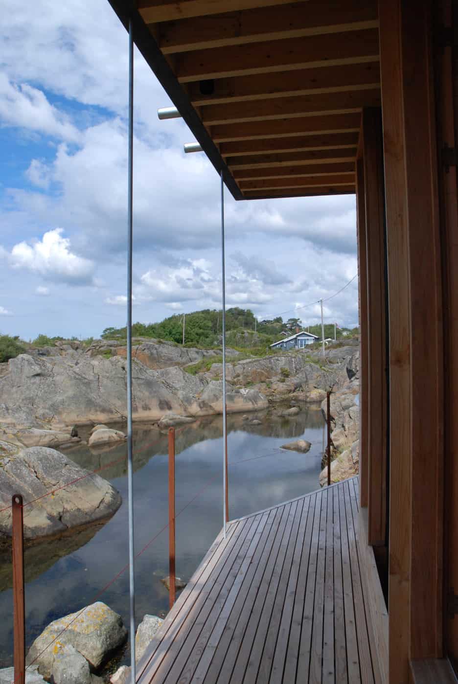 13 boat access only 75sqm summer cabin straddles boulders