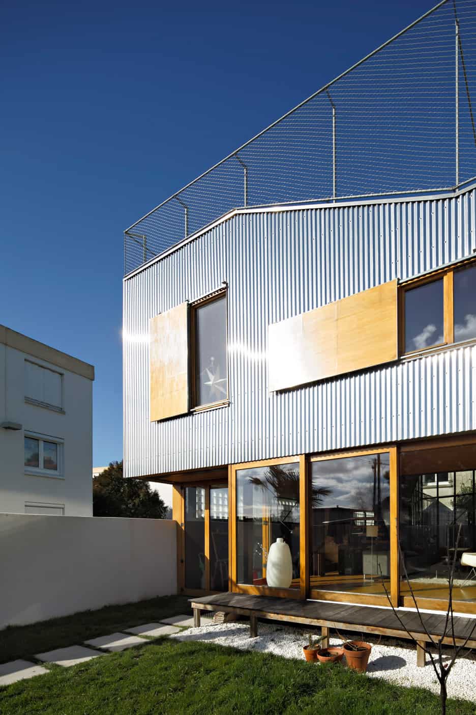 20 corrugated aluminium facade 1930s home extension