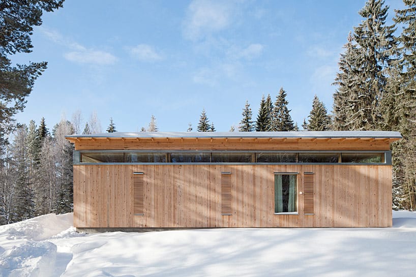 4-season-timber-cottage-built-by-single-carpenter-5-rear.jpg