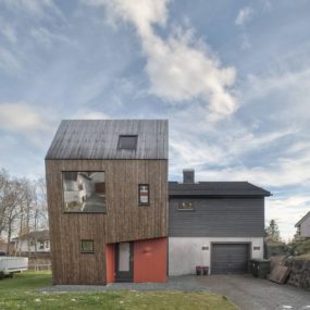 Angular Home Addition With Plywood-Lined Interior
