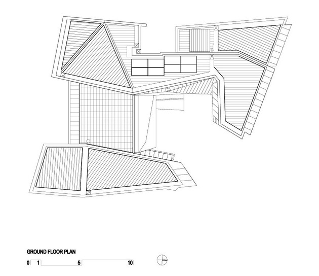 geometric-beach-house-with-zinc-exterior-wood-interior-17.jpg