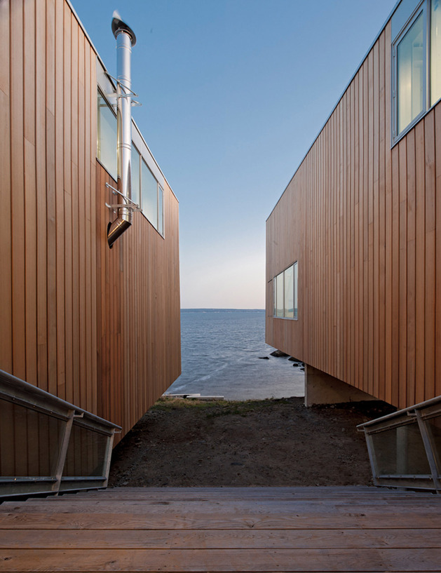 boat-inspired-wood-house-hanging-over-the-ocean-5.jpg