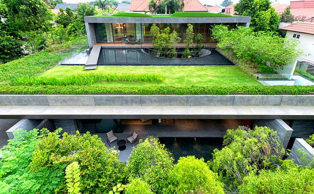 modern house with underground courtyard and rooftop gardens 1 thumb 630x390 12778 Home with Underground Courtyard and Rooftop Gardens