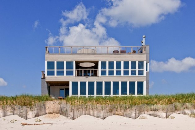 glass gives long island seashore house front view sun tube thumb 630x420 14376 Prefab Gives Long Island Seashore Home Focus and View