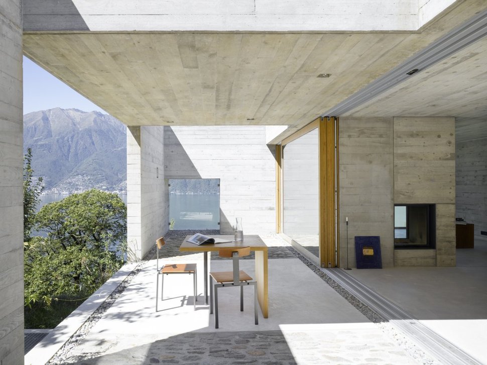minamalist-concretehome-showcases-stunning-views-and-contemporaryliving-5-sliding-doors.jpg