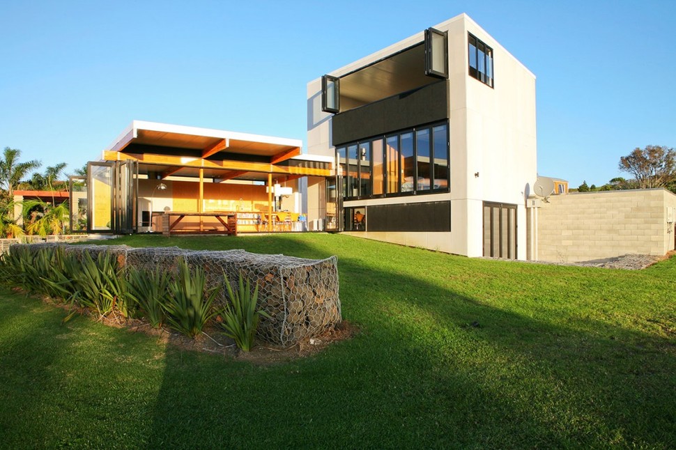 modern-suburban-lake-house-designed-private-beachside-living-2-windows.jpg