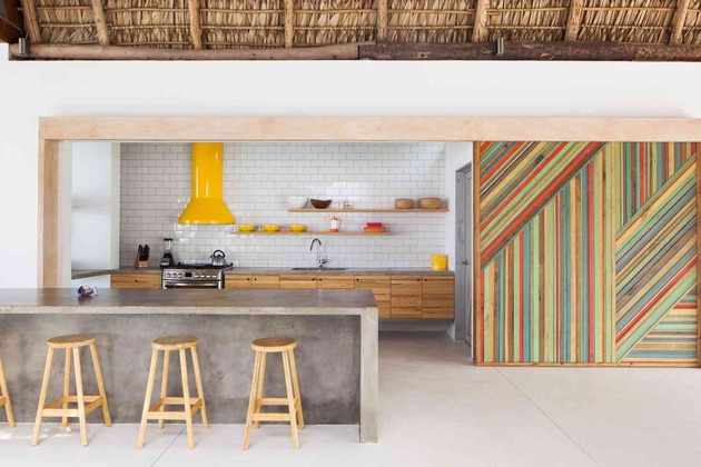colorful-tropical-open-home-rough-cut-thatched-roof-7-kitchen.jpg