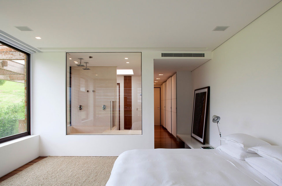 contemporary-hillside-home-brazil-disappears-into-landscape-11-bedroom.jpg