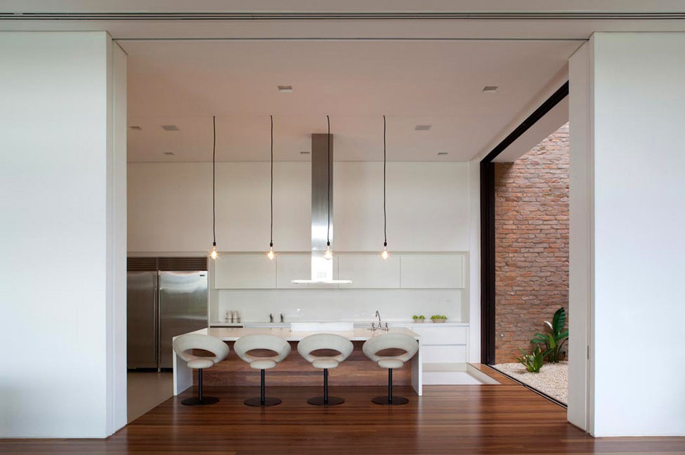 contemporary-hillside-home-brazil-disappears-into-landscape-8-kitchen.jpg