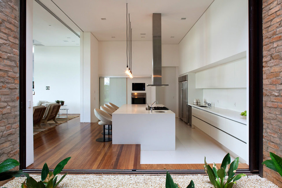 contemporary-hillside-home-brazil-disappears-into-landscape-9-kitchen.jpg