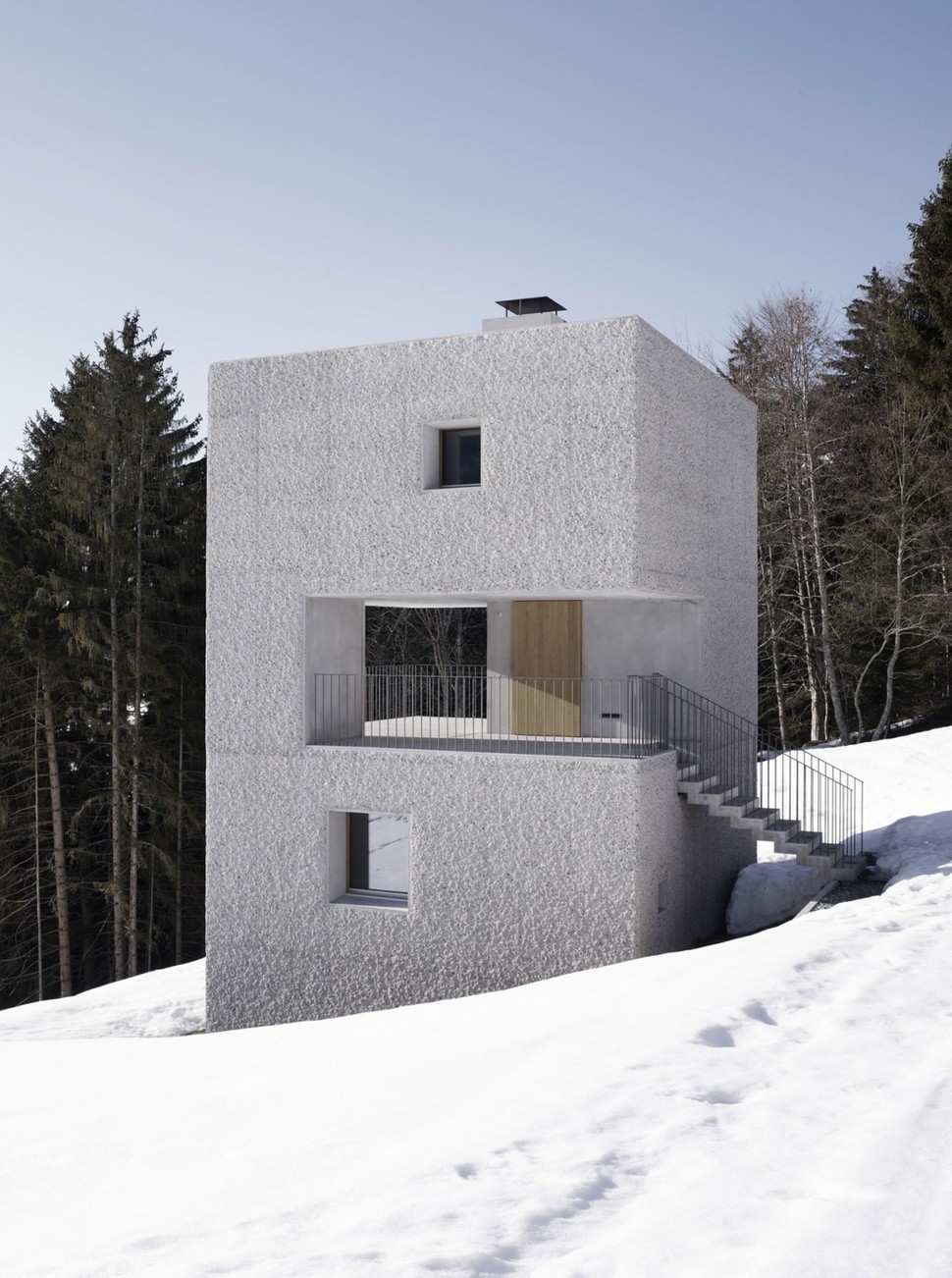 cubic-concrete-mountain-cabin-by-marte.marte-architekten-4.jpg