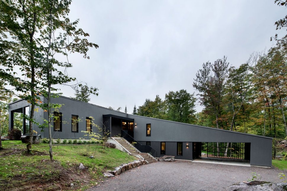 diagonal-roofline-defines-extensive-canadian-hill-lot-home-2-front-angle-view.jpg